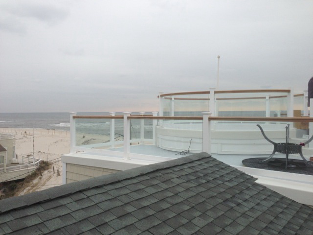 coastal-roofing-oceanfront-home-glass-rails-01